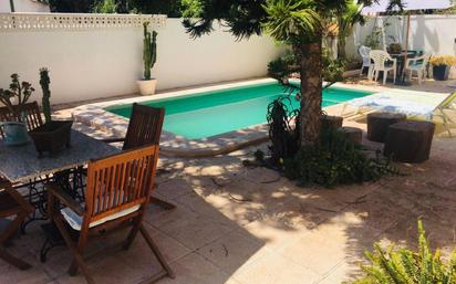 Piscina de Planta baixa en venda en Pilar de la Horadada amb Calefacció, Jardí privat i Traster