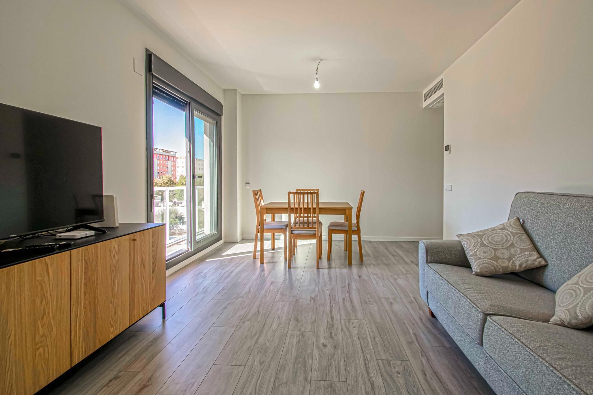 Living room of Flat for sale in  Sevilla Capital  with Air Conditioner, Heating and Private garden