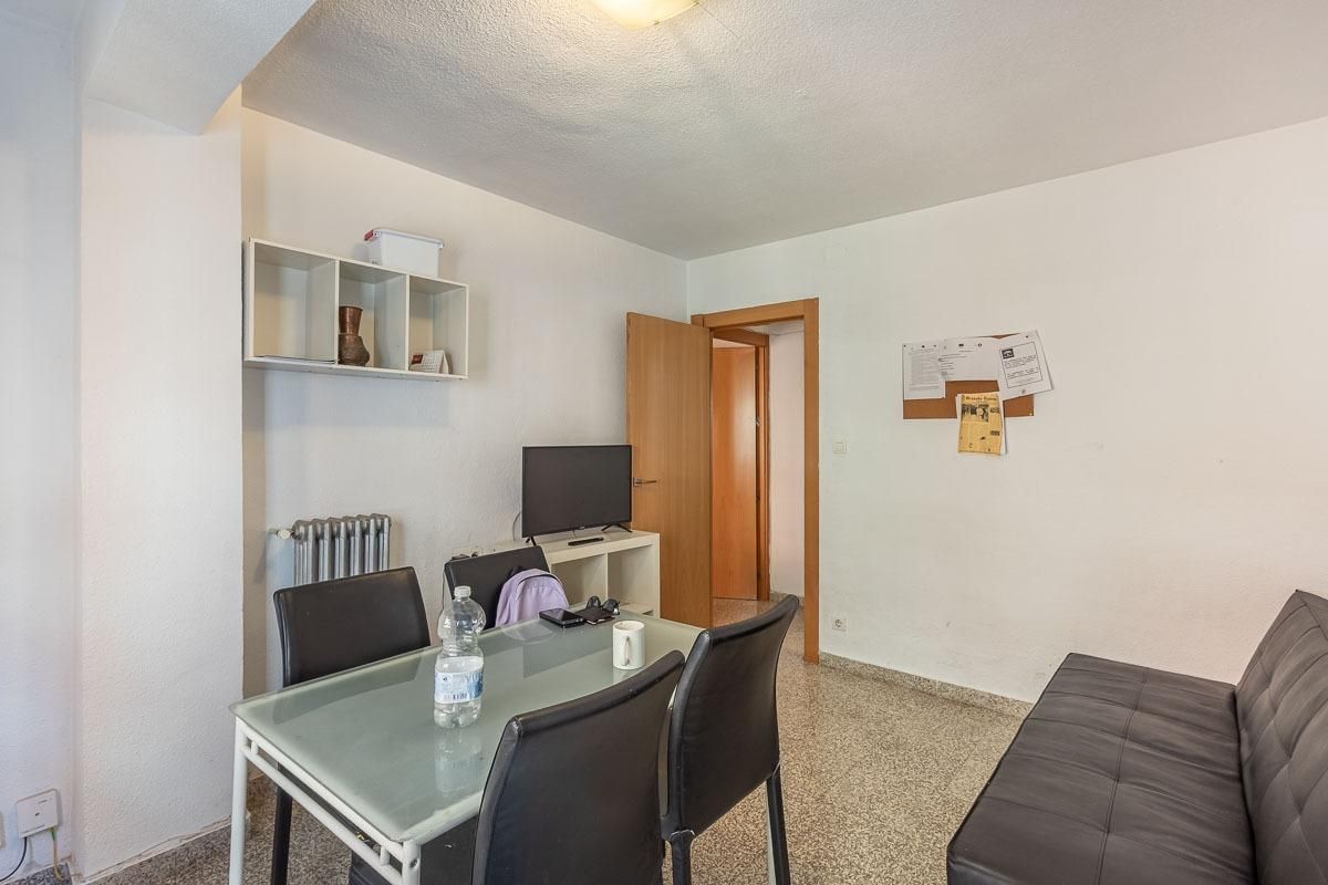 Sala de estar de Piso en venta en  Granada Capital con Calefacción y Terraza