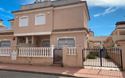 Vista exterior de Casa adosada en venda en San Javier amb Terrassa