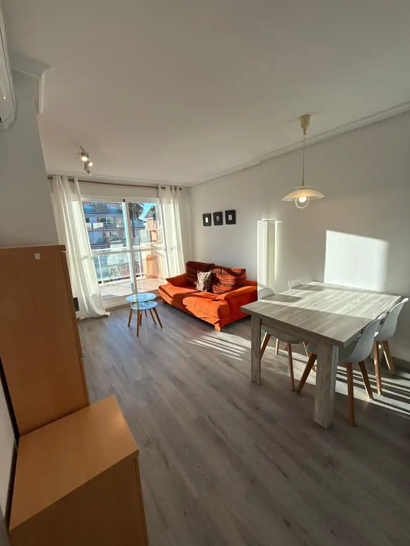 Sala d'estar de Apartament en venda en Dénia amb Aire condicionat, Jardí privat i Terrassa