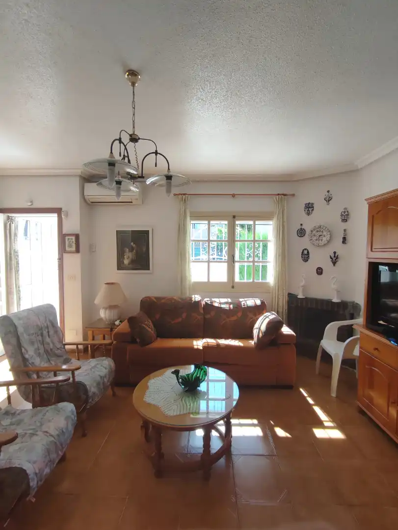 Sala de estar de Casa adosada en venta en San Pedro del Pinatar con Aire acondicionado, Calefacción y Jardín privado