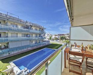 Swimming pool of Flat for sale in Cubelles  with Air Conditioner, Terrace and Swimming Pool