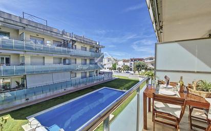 Swimming pool of Flat for sale in Cubelles  with Air Conditioner, Terrace and Swimming Pool