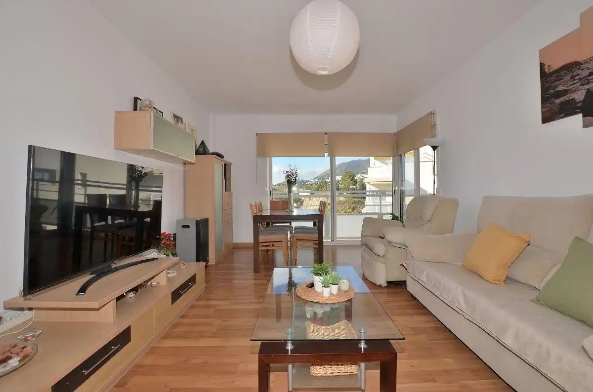 Sala de estar de Ático en venta en Benalmádena con Terraza, Trastero y Piscina comunitaria