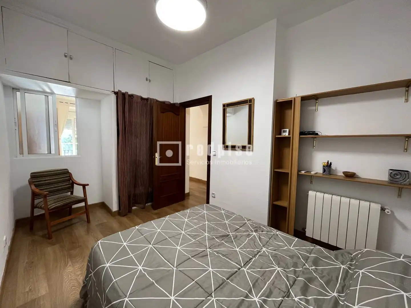 Schlafzimmer von Wohnung zur Miete in Madrid mit Heizung und Möbliert