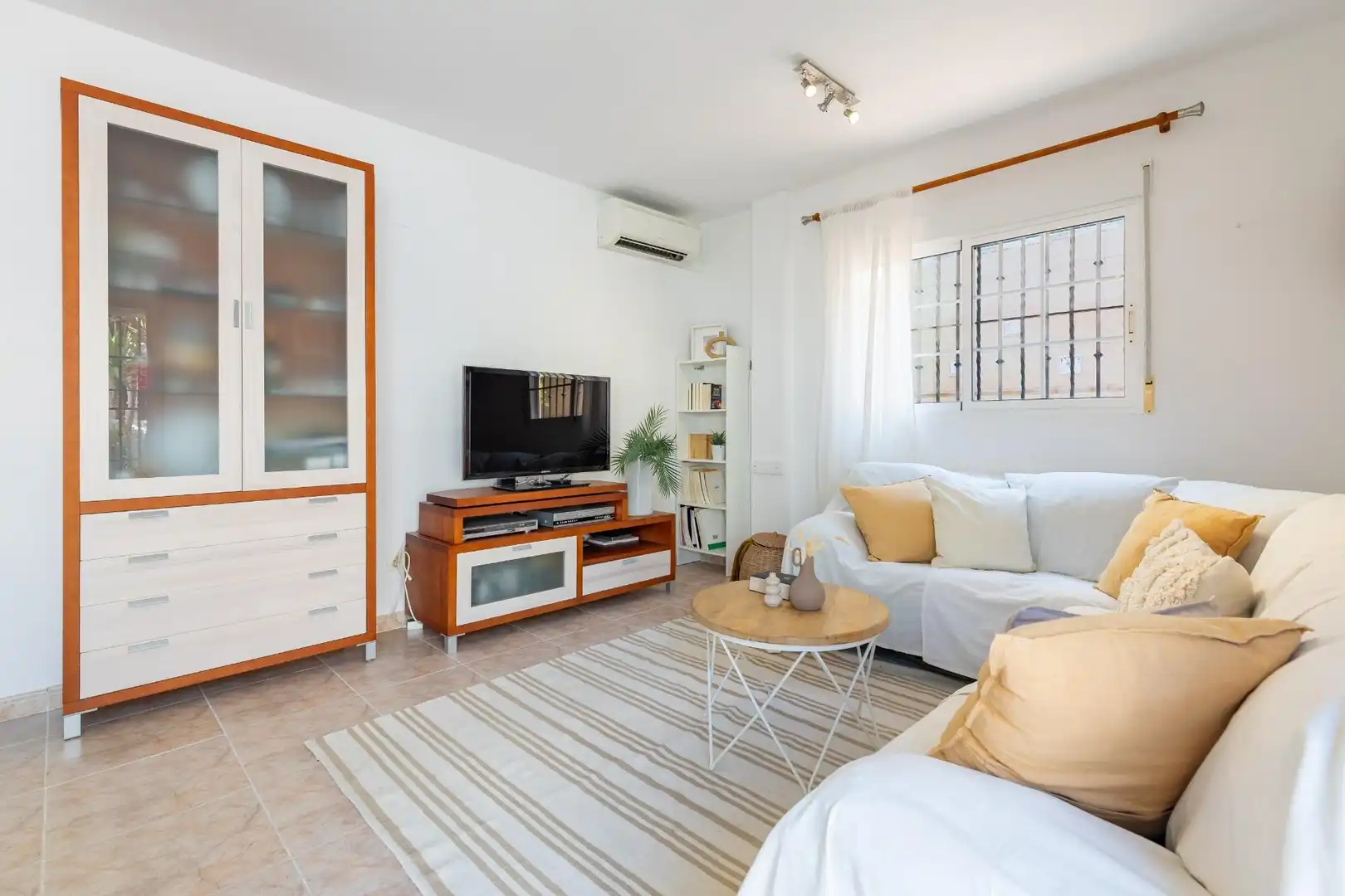 Sala d'estar de Casa adosada en venda en Cullera amb Aire condicionat, Calefacció i Terrassa