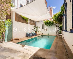 Swimming pool of House or chalet for sale in  Madrid Capital  with Air Conditioner, Heating and Private garden