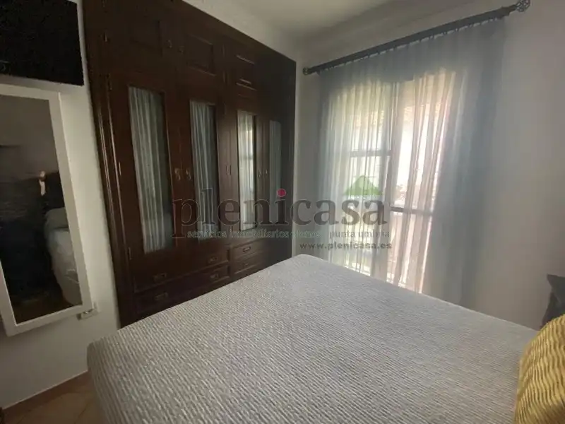 Habitación de Casa adosada en venta en Punta Umbría con Aire acondicionado, Calefacción y Jardín privado