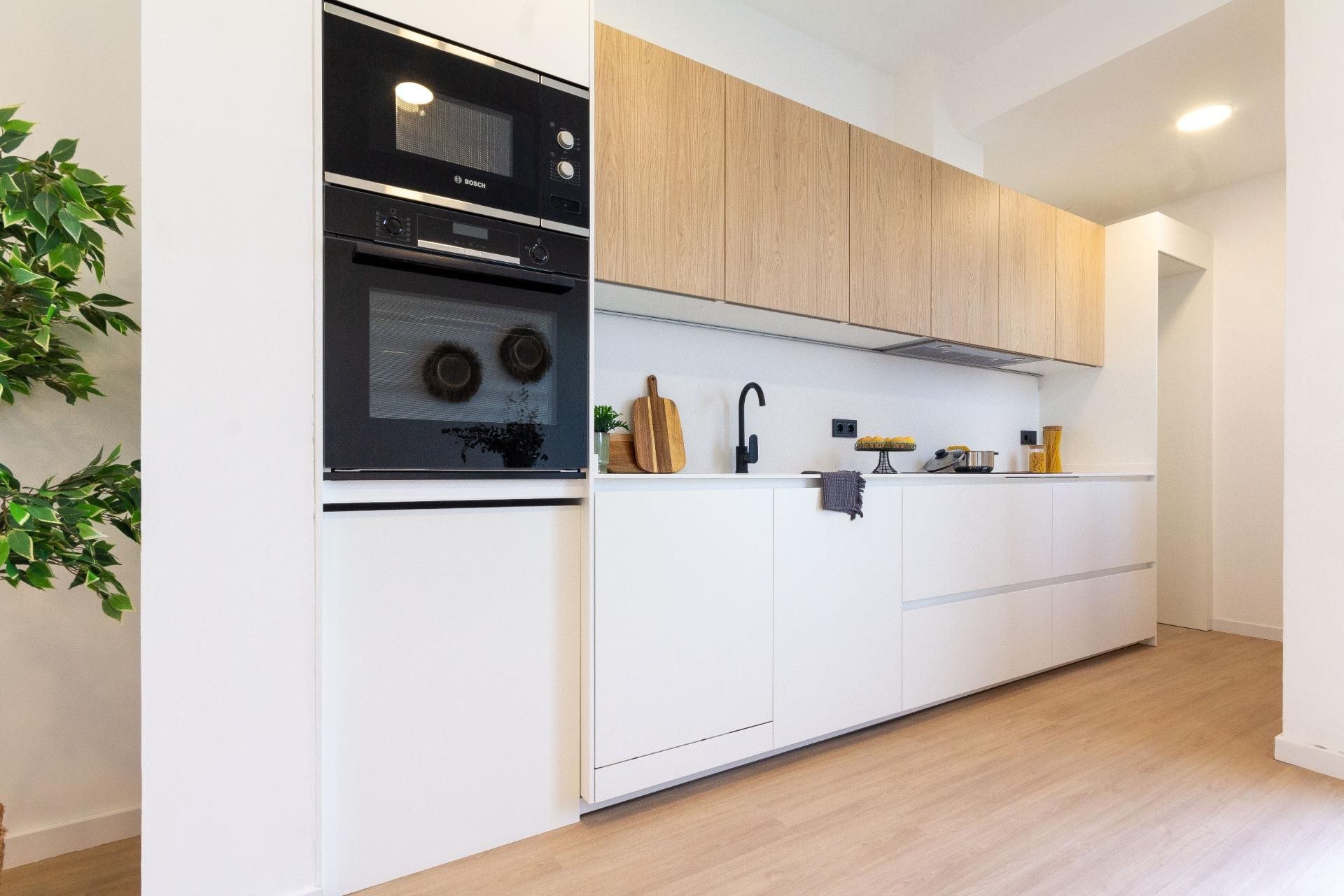 Kitchen of Planta baja for sale in Sabadell  with Air Conditioner, Heating and Parquet flooring