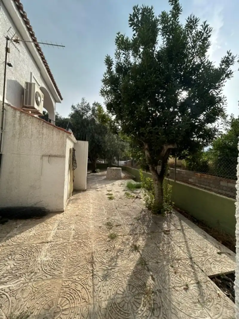 Vista exterior de Casa o xalet en venda en Palma de Gandia amb Aire condicionat, Terrassa i Piscina