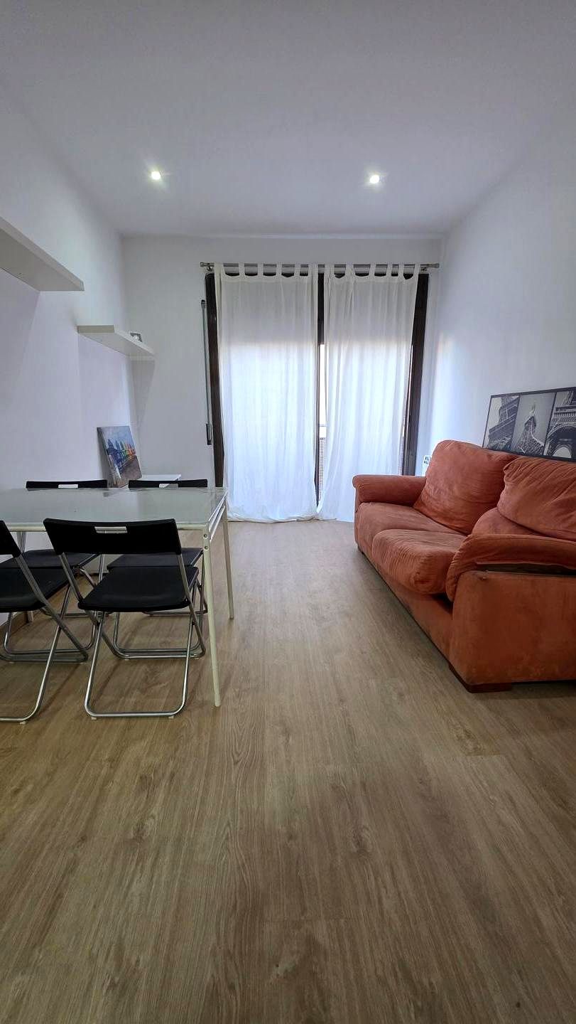 Living room of Flat for sale in Terrassa  with Heating, Parquet flooring and Balcony