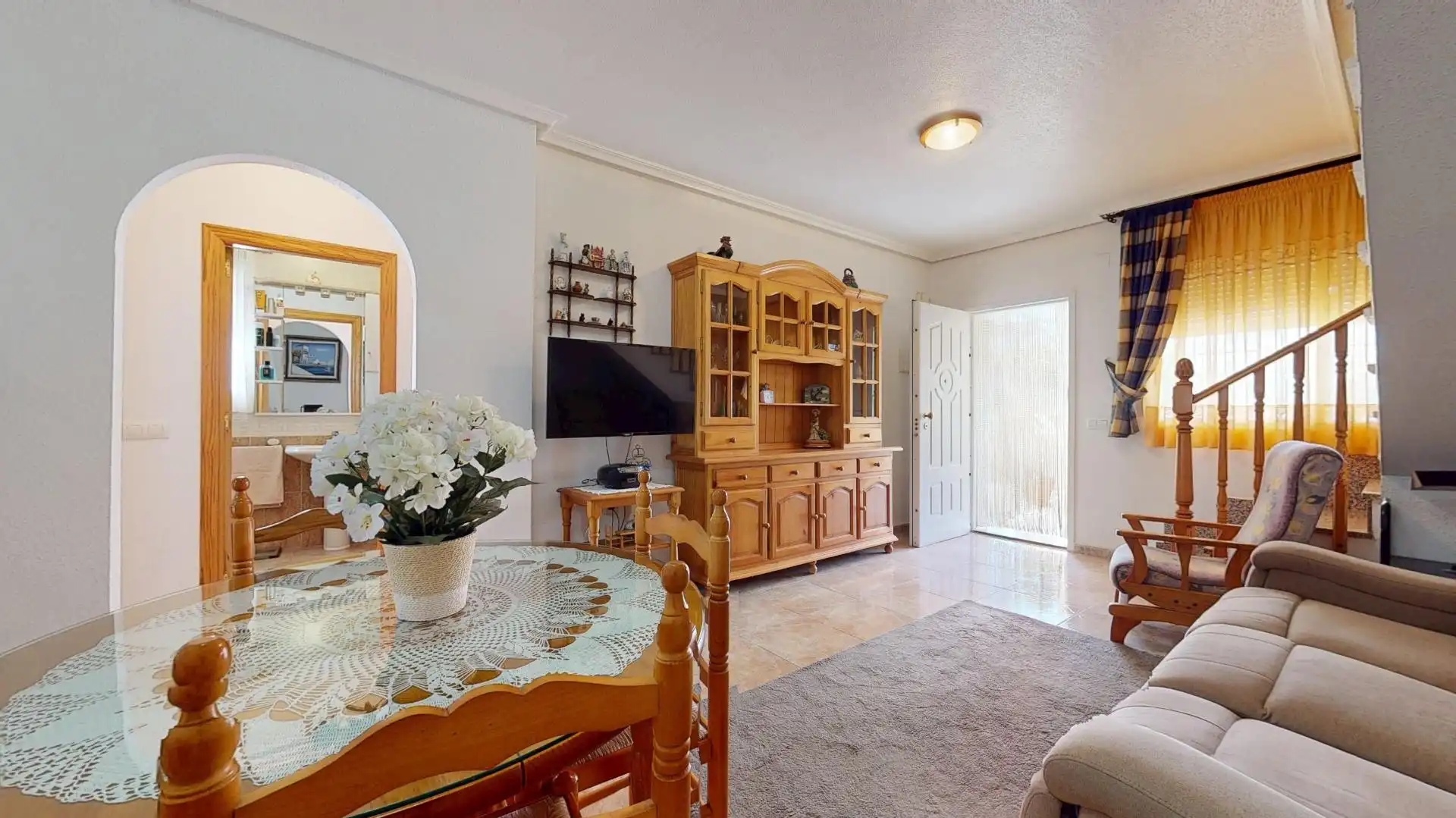 Sala de estar de Casa adosada en venta en Pilar de la Horadada con Aire acondicionado, Jardín privado y Terraza