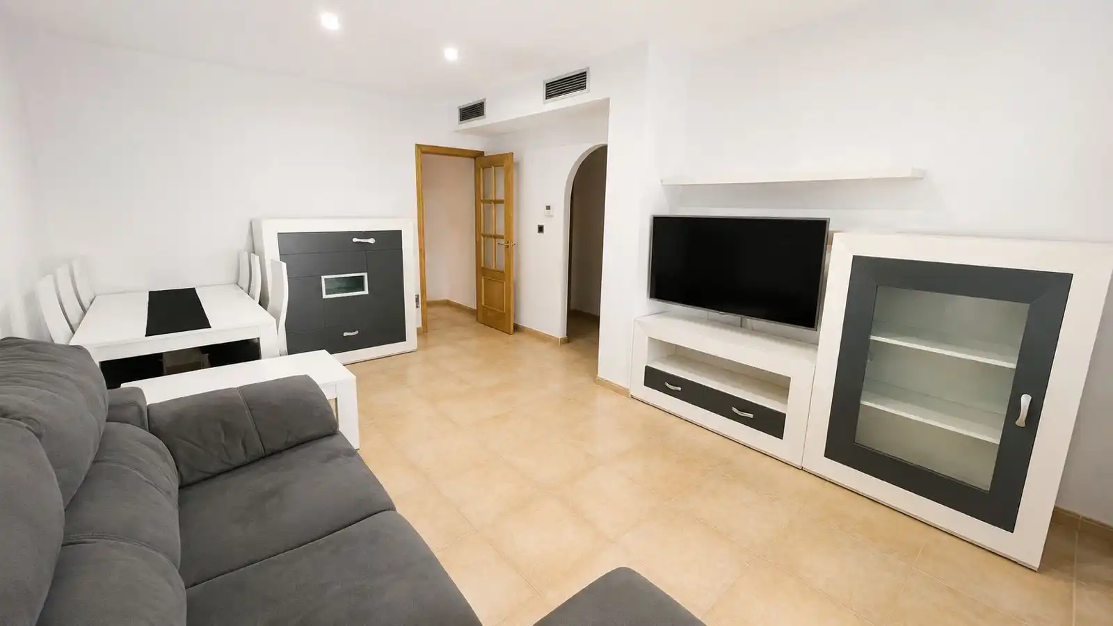 Sala d'estar de Apartament en venda en Águilas amb Jardí privat i Piscina comunitària