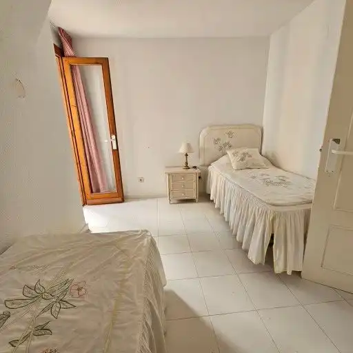 Dormitori de Casa adosada en venda en La Manga del Mar Menor amb Jardí privat, Terrassa i Moblat