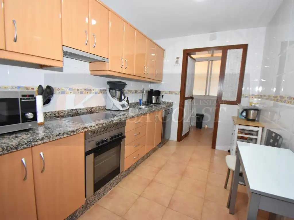 Kitchen of Flat for sale in Mijas  with Air Conditioner, Private garden and Terrace
