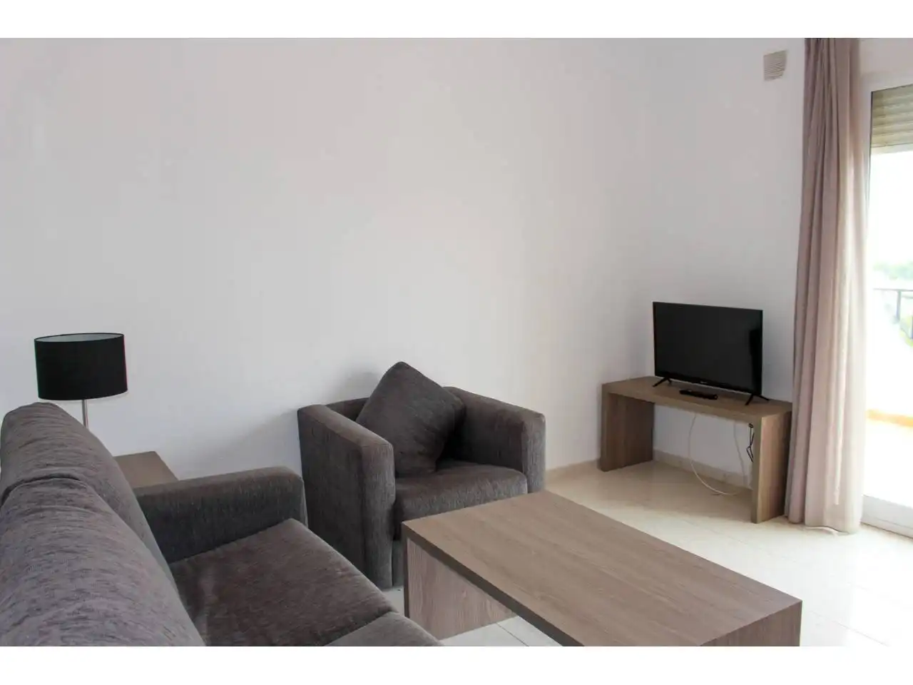 Wohnzimmer von Einfamilien-Reihenhaus zum Verkauf in Calpe / Calp mit Klimaanlage, Terrasse und Möbliert