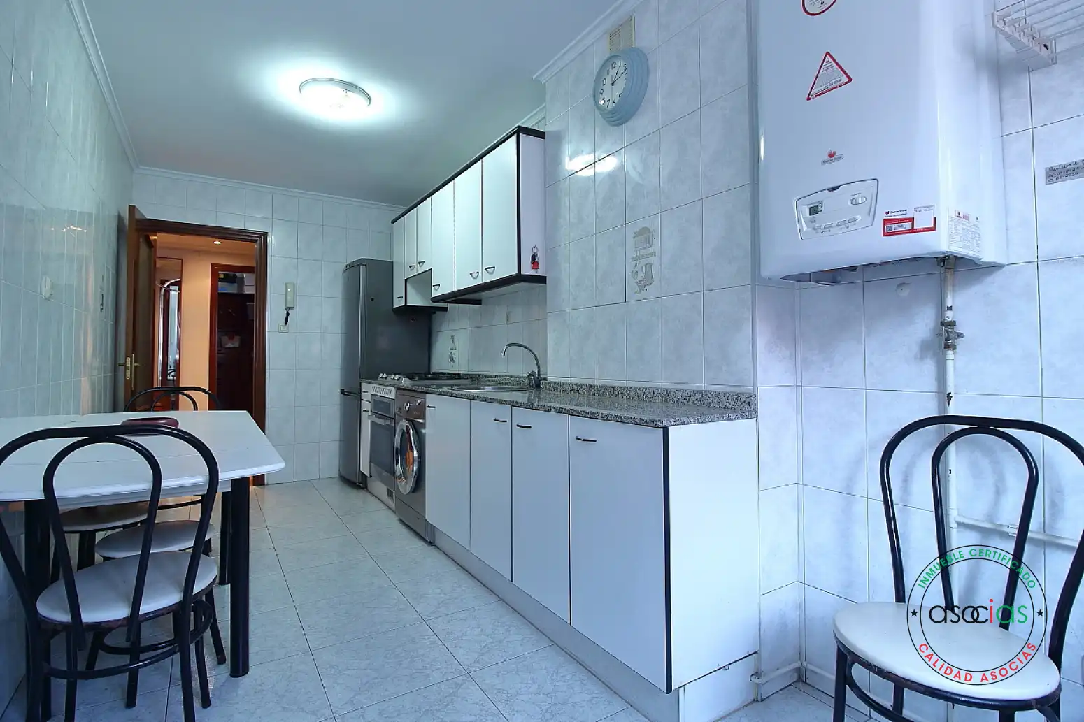 Kitchen of Flat for sale in Gijón   with Heating, Parquet flooring and Storage room