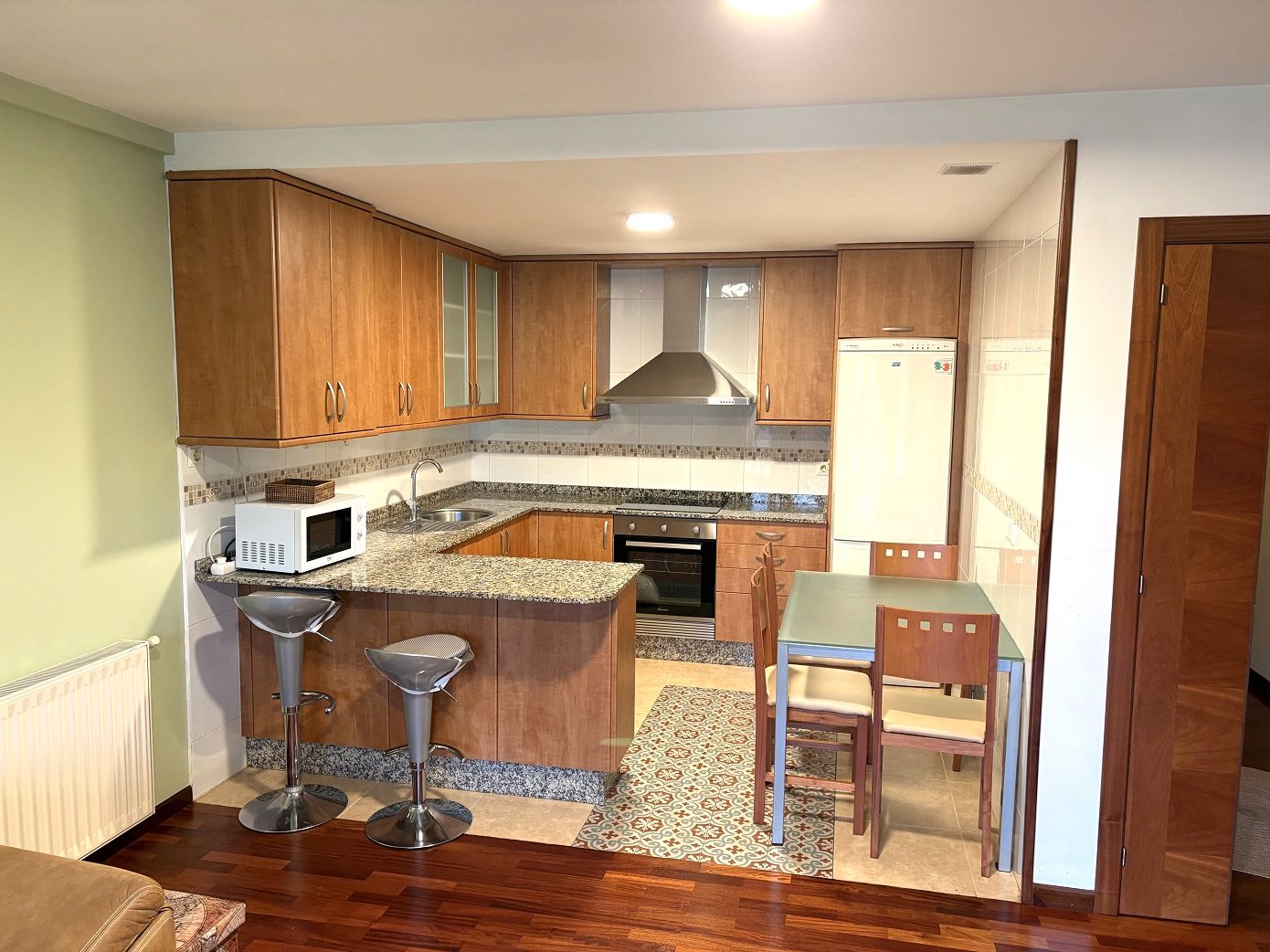 Kitchen of Flat to rent in Carral  with Heating, Parquet flooring and Storage room