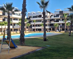 Piscina de Apartament de lloguer en Orihuela amb Aire condicionat, Jardí privat i Terrassa