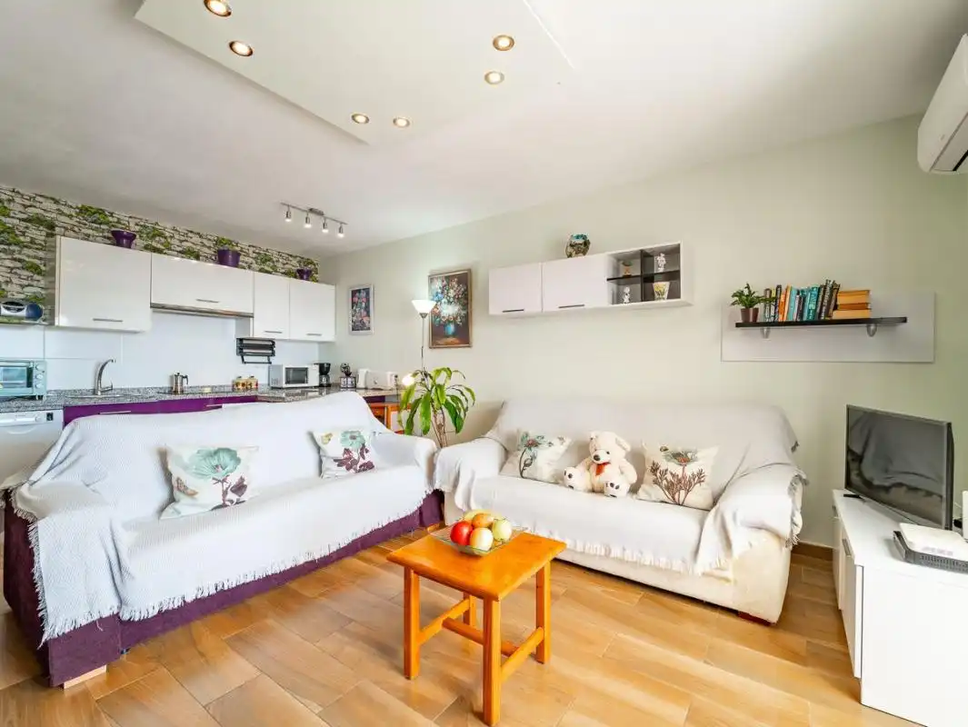 Sala de estar de Planta baja en venta en Nerja con Aire acondicionado, Calefacción y Terraza