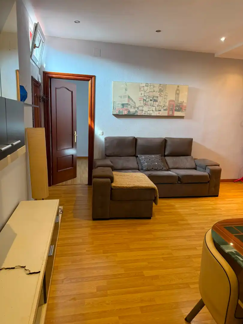Living room of Flat for sale in Gijón   with Heating, Parquet flooring and Furnished