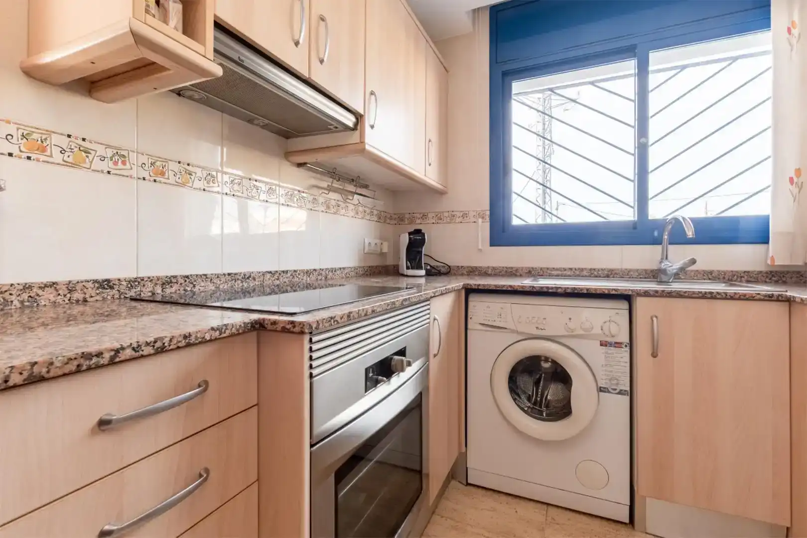 Kitchen of Flat for sale in L'Ampolla  with Air Conditioner, Private garden and Swimming Pool