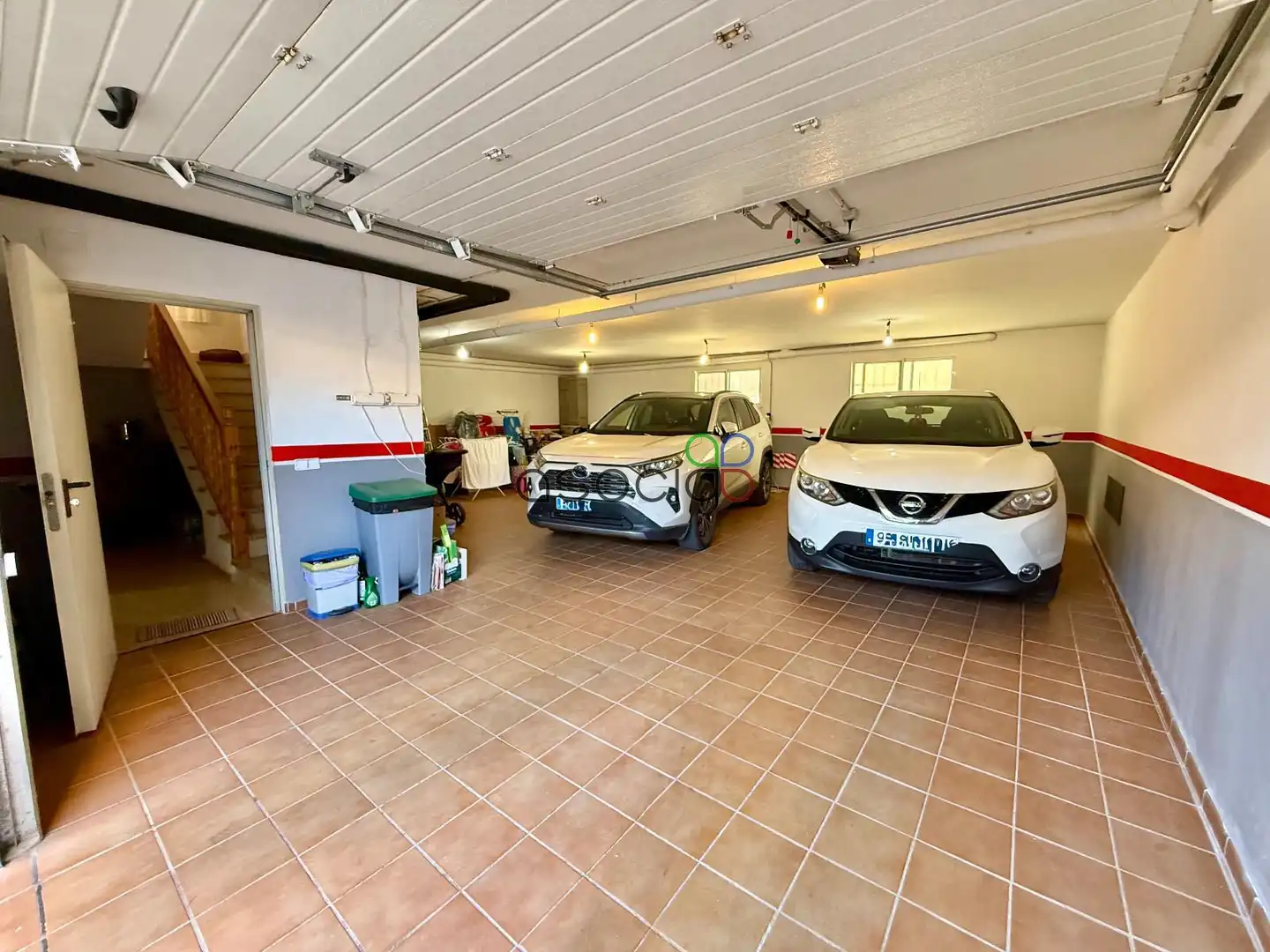 Parking de Casa adosada en venta en Cabanillas del Campo con Aire acondicionado, Calefacción y Jardín privado