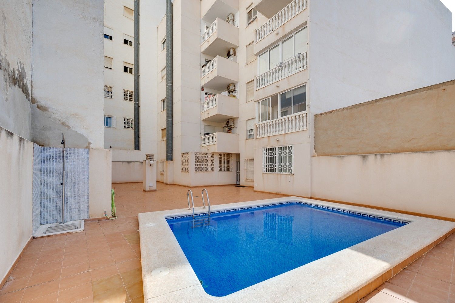 Swimming pool of Apartment for sale in Torrevieja  with Air Conditioner, Heating and Terrace