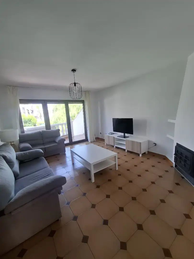 Sala d'estar de Casa adosada en venda en Villaviciosa de Odón amb Aire condicionat, Calefacció i Jardí privat