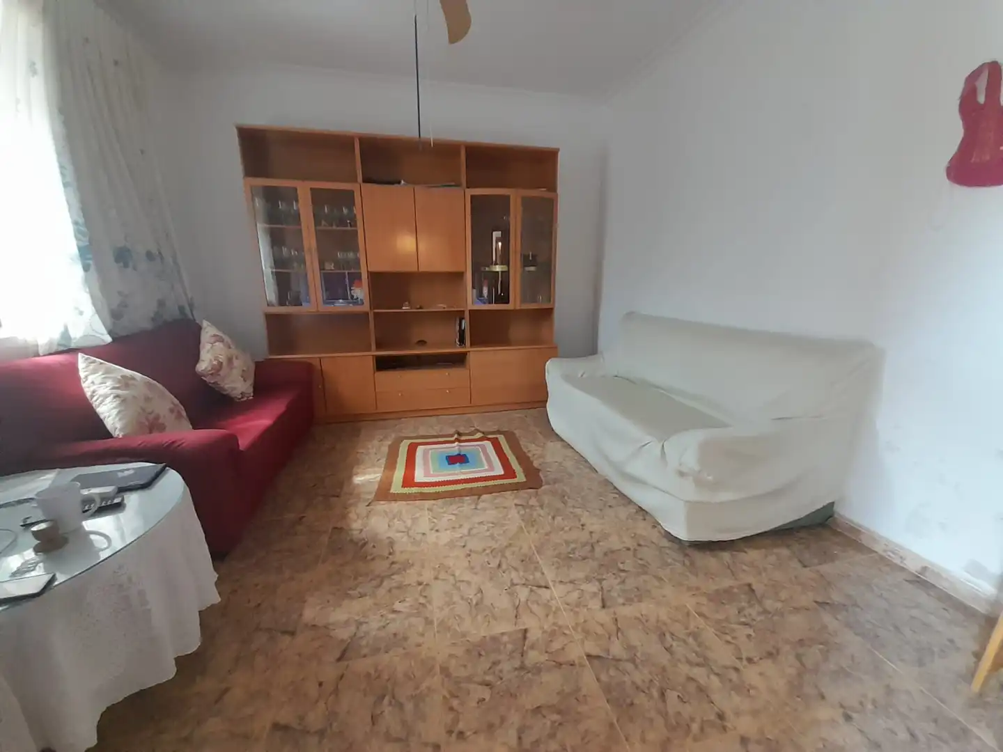Sala d'estar de Casa adosada en venda en Puertollano amb Aire condicionat i Traster