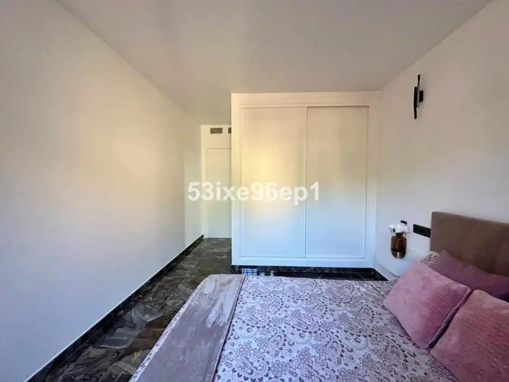 Habitación de Apartamento de alquiler en Marbella con Aire acondicionado, Jardín privado y Terraza