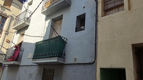 Edificio con dos pisos y un local, y una casa apareada, imagen 5