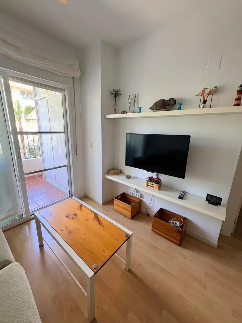 Sala de estar de Piso de alquiler en Motril con Jardín privado, Terraza y Amueblado