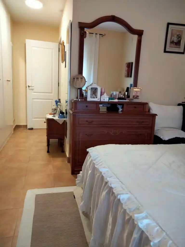 Habitación de Casa adosada en venta en Islantilla con Piscina comunitaria