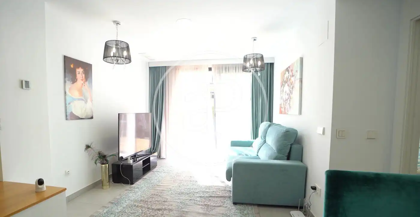Wohnzimmer von Einfamilien-Reihenhaus zum Verkauf in Villajoyosa / La Vila Joiosa mit Klimaanlage, Heizung und Privatgarten