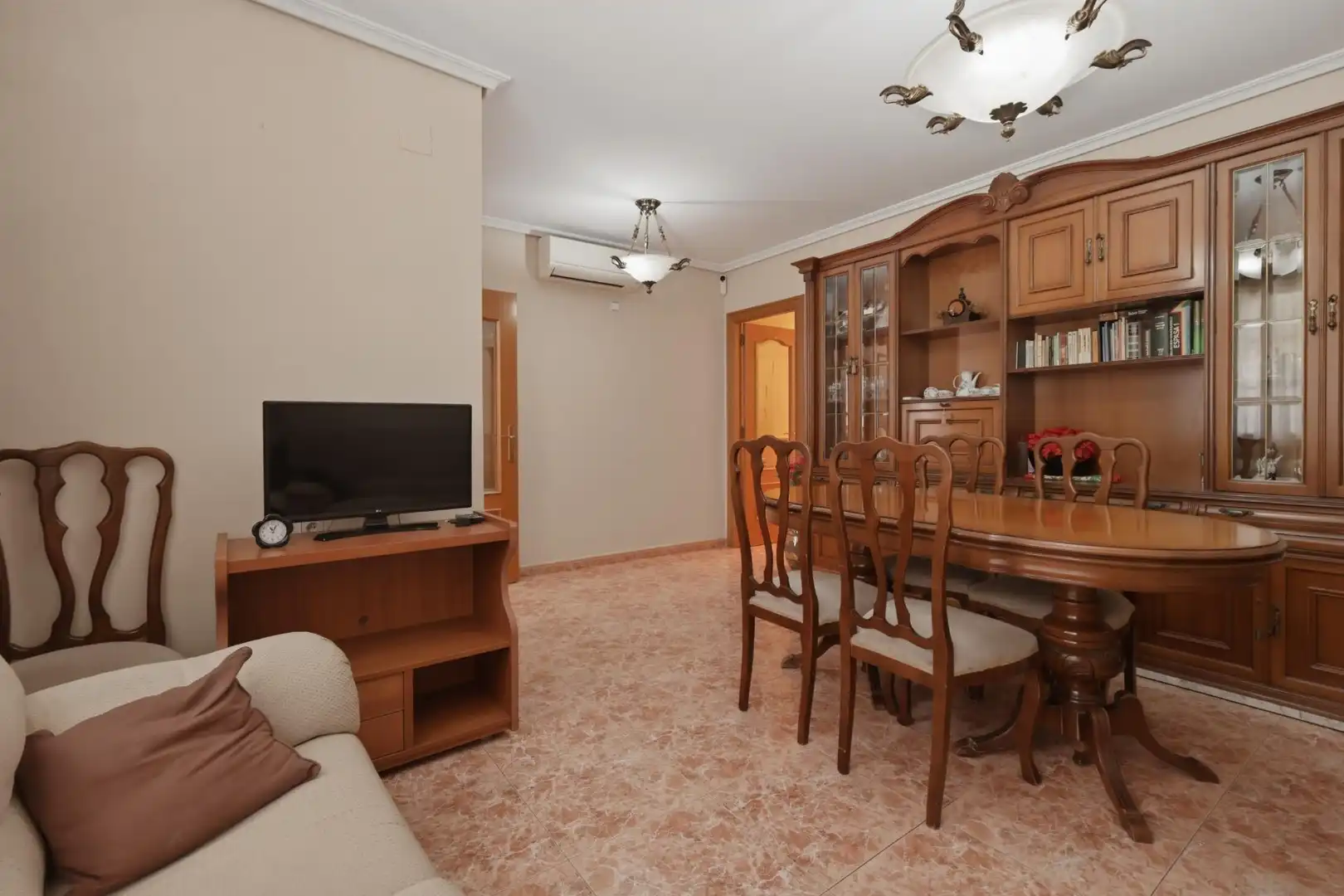 Sala d'estar de Casa adosada en venda en Torrent