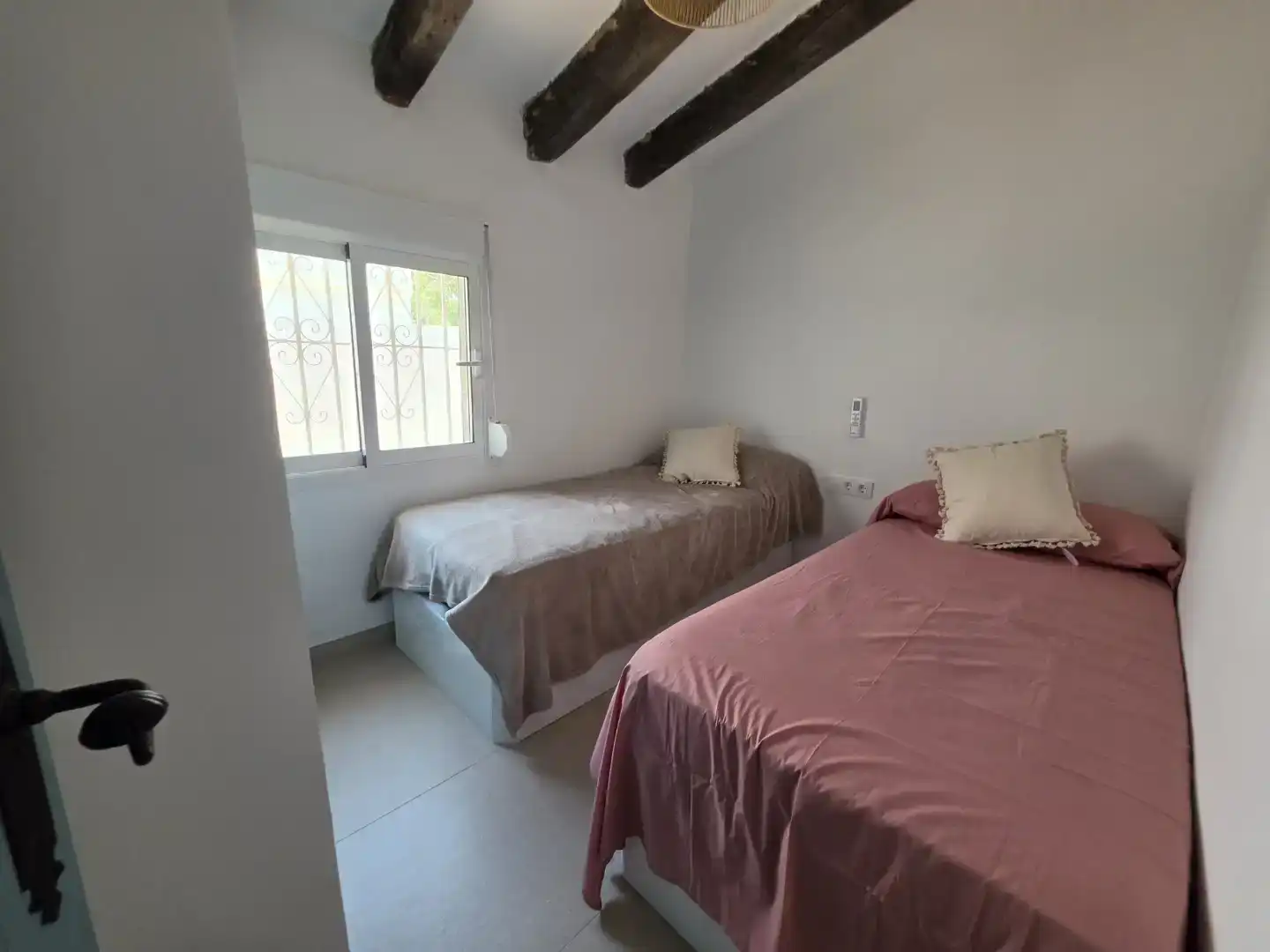 Dormitori de Casa o xalet de lloguer en Dénia amb Aire condicionat, Jardí privat i Traster