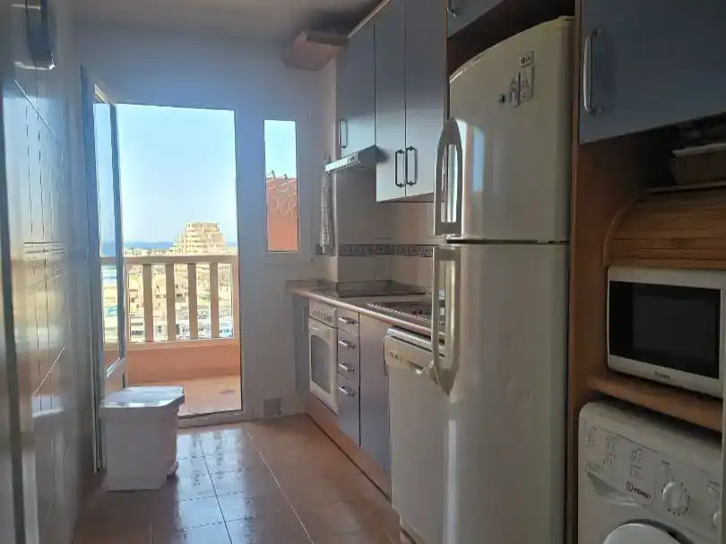 Kitchen of Flat for rent in La Manga del Mar Menor  with Swimming Pool, Furnished and Balcony