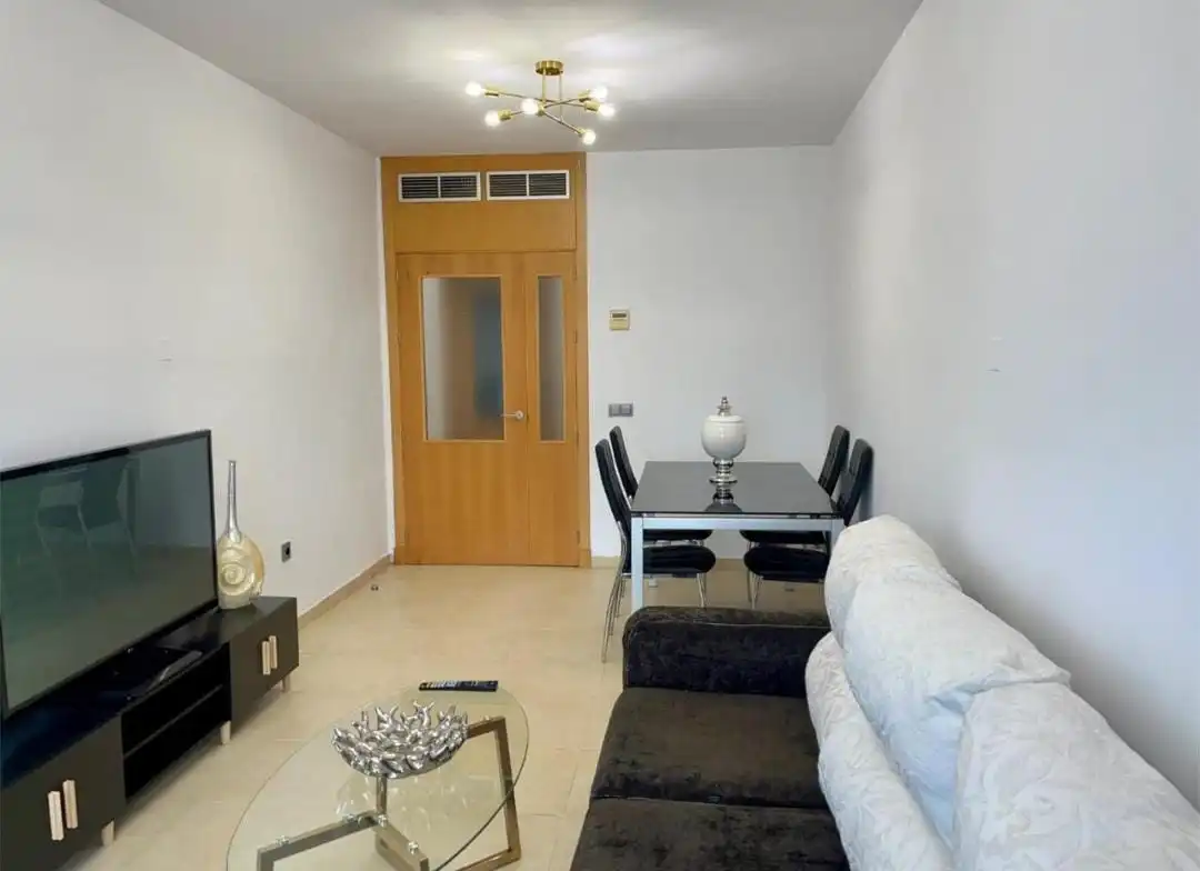 Wohnzimmer von Wohnung zum Verkauf in Roquetas de Mar mit Klimaanlage, Heizung und Terrasse
