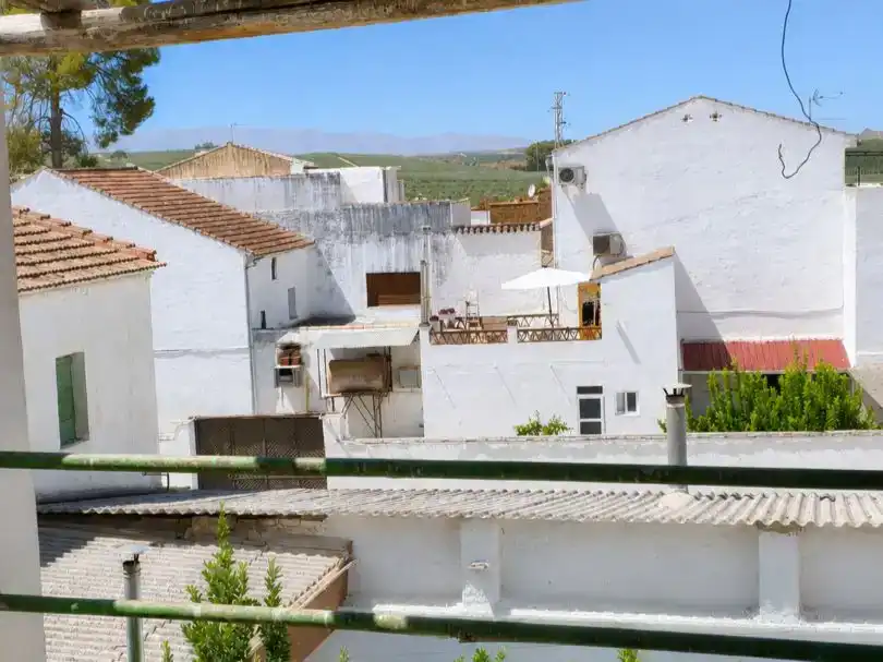 Vista exterior de Casa adosada en venda en Pinos Puente amb Balcó