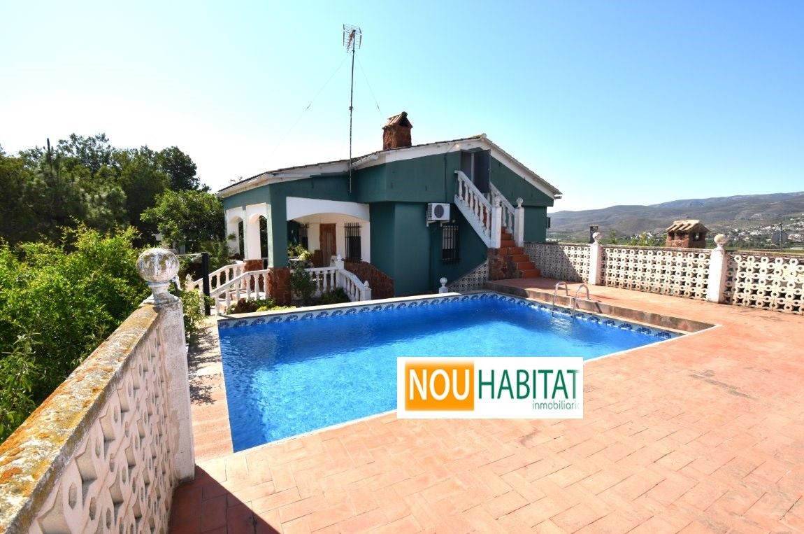 Vista exterior de Casa o xalet en venda en Montroy amb Aire condicionat, Jardí privat i Terrassa