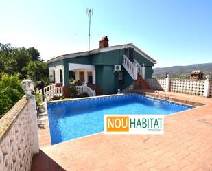 Vista exterior de Casa o xalet en venda en Montroy amb Aire condicionat, Jardí privat i Terrassa