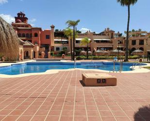 Exterior view of Planta baja for sale in Estepona  with Air Conditioner, Terrace and Swimming Pool