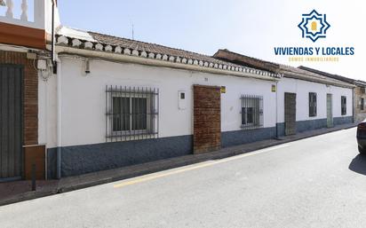 Vista exterior de Casa adosada en venda en Churriana de la Vega amb Calefacció