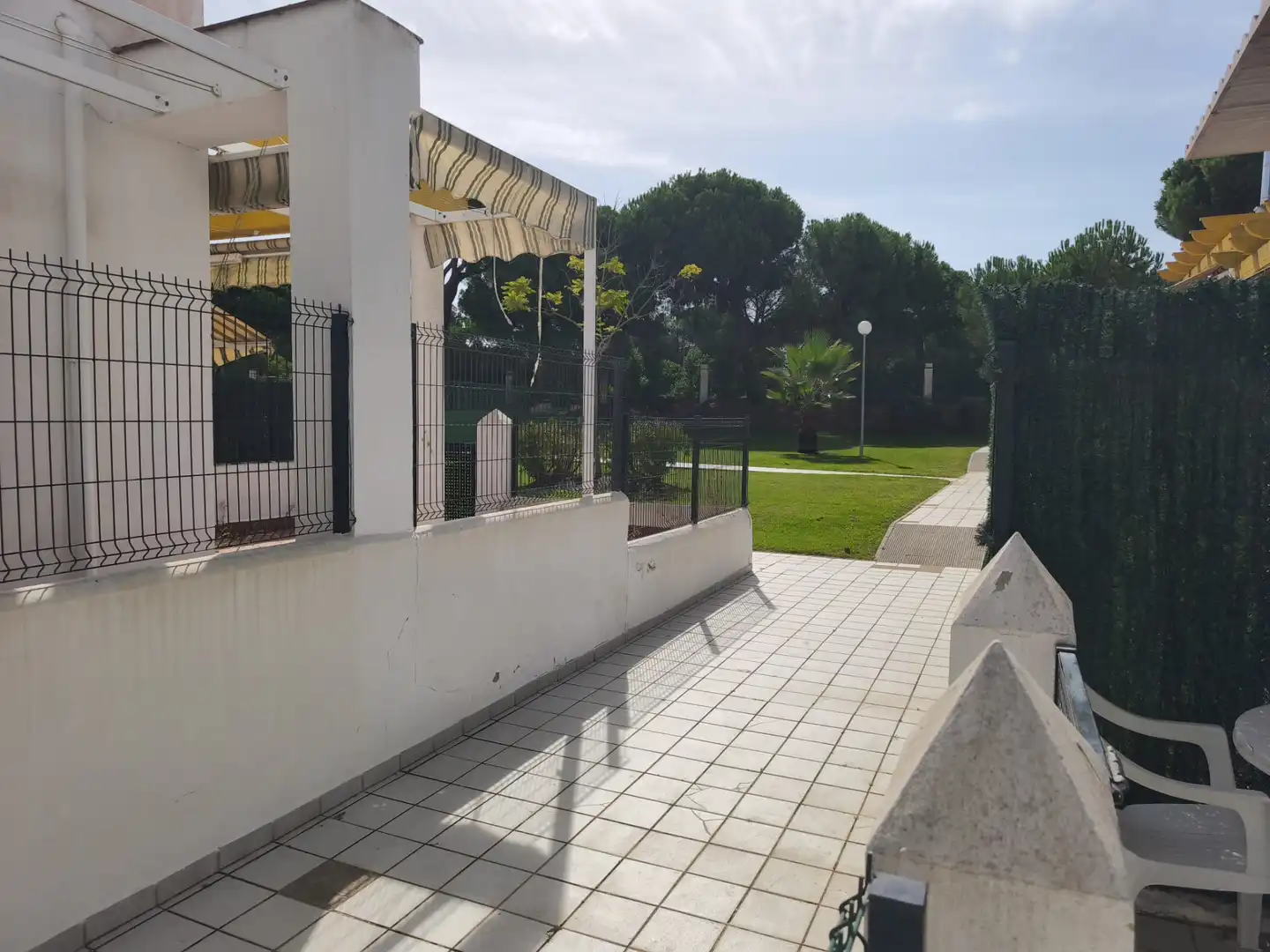 Terrassa de Casa adosada en venda en El Portil amb Terrassa, Moblat i Piscina comunitària