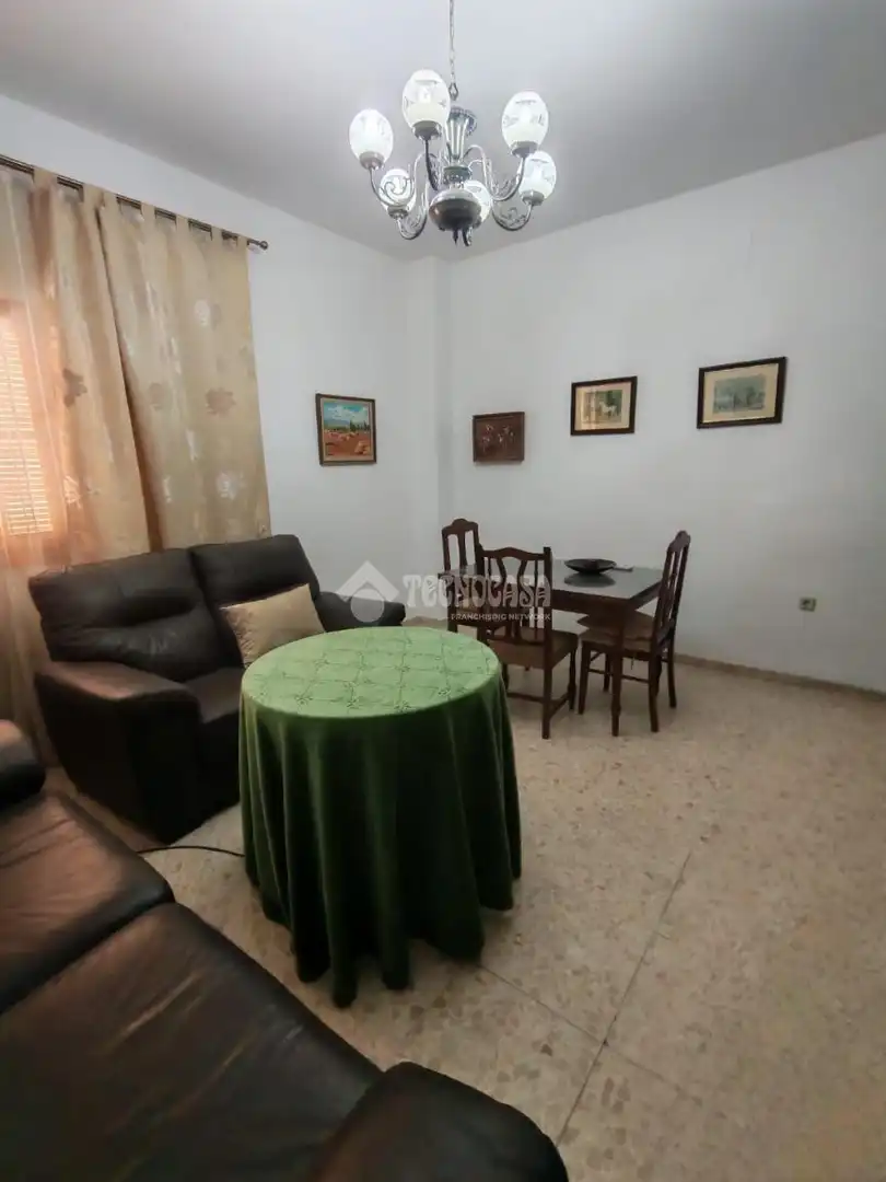 Sala d'estar de Casa adosada en venda en Marchena amb Aire condicionat