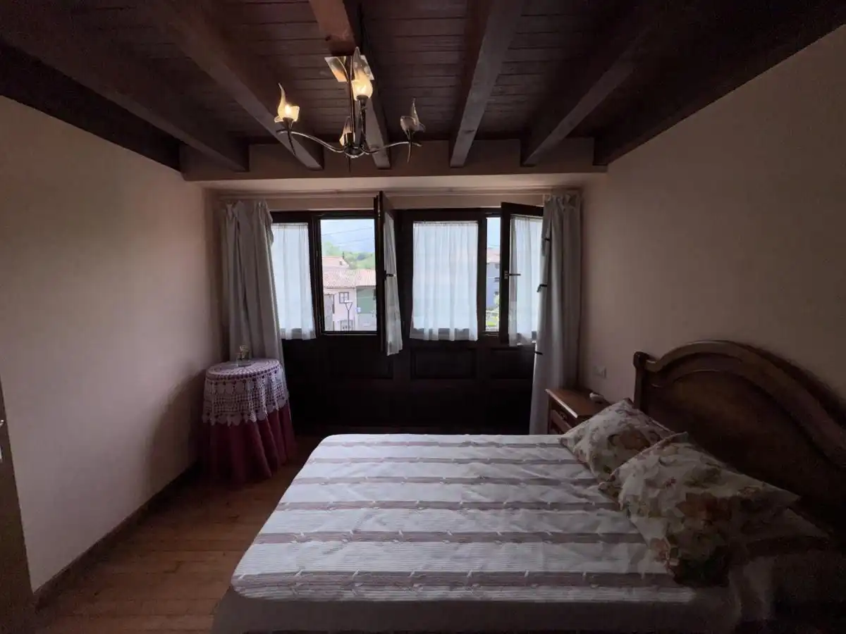 Habitación de Casa adosada en venta en Llanes con Calefacción, Jardín privado y Terraza