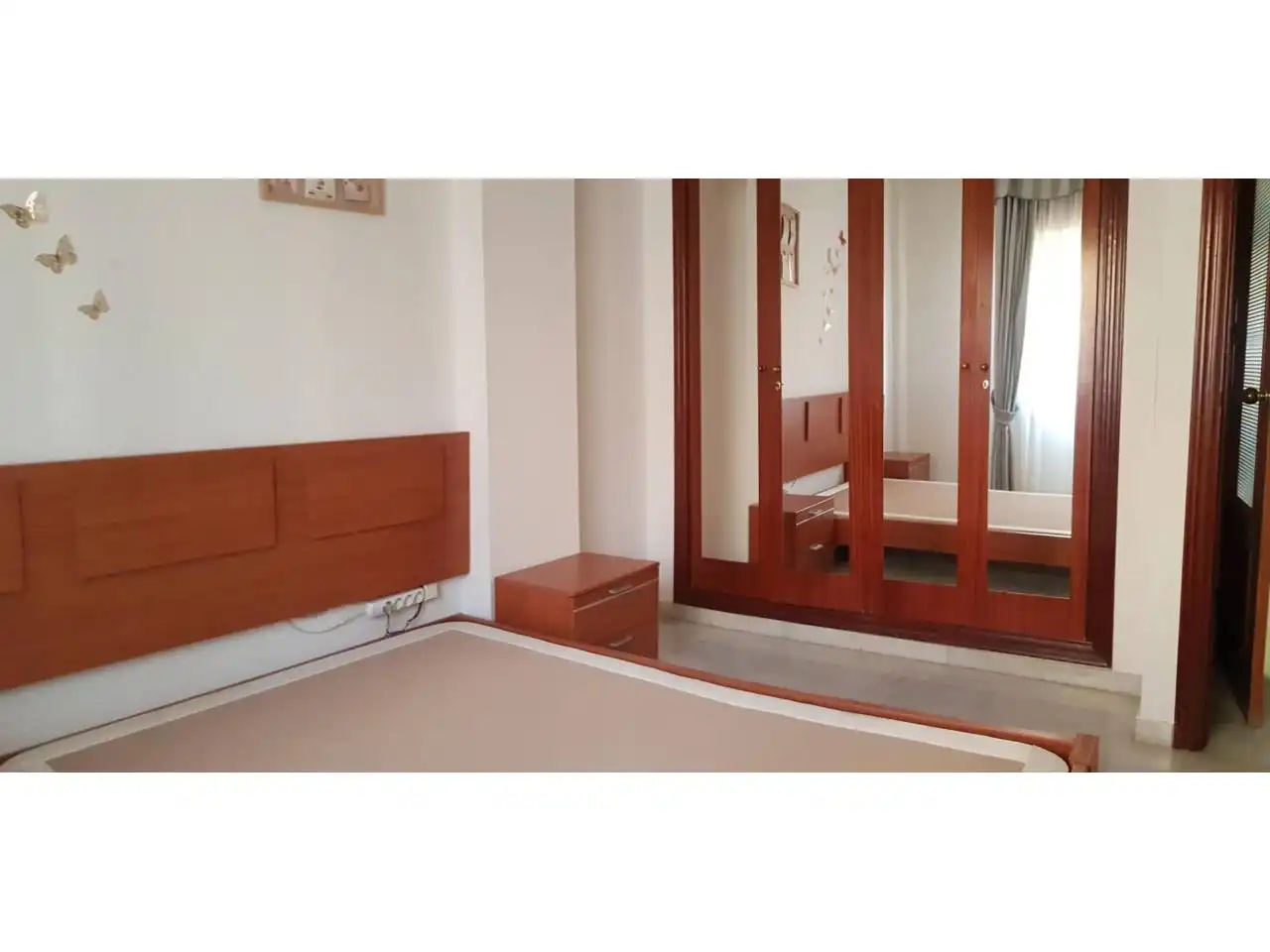 Habitación de Piso de alquiler en Sevilla con Aire acondicionado, Balcón y Piscina comunitaria