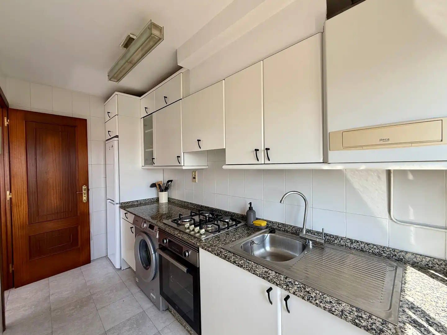 Kitchen of Flat for sale in O Grove    with Storage room, Furnished and Oven